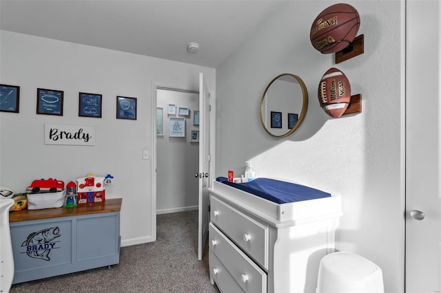 interior space featuring carpet floors and baseboards