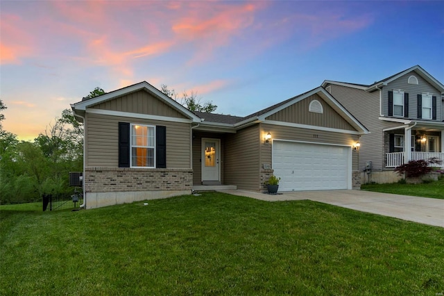 view of front facade with a yard, driveway, board and batten siding, brick siding, and a garage