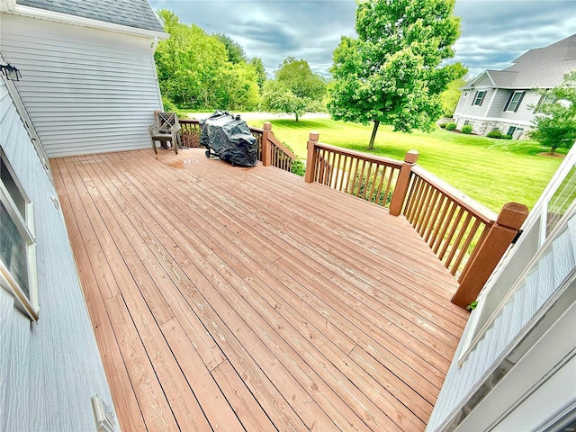 wooden deck with a yard