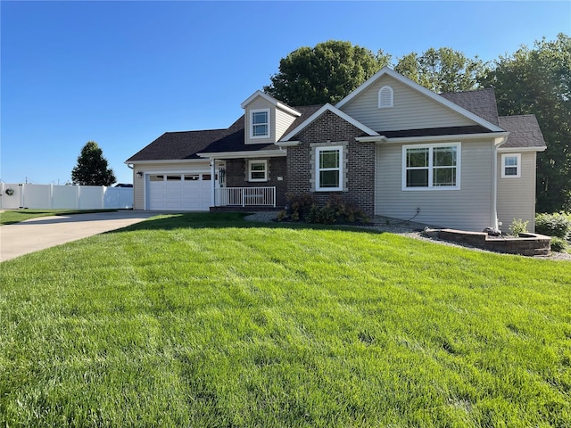 view of front of home with driveway, a garage, and brick siding