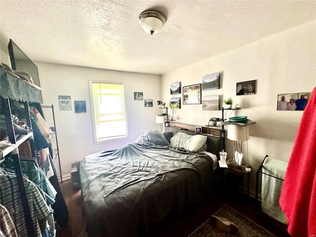 bedroom featuring a textured ceiling