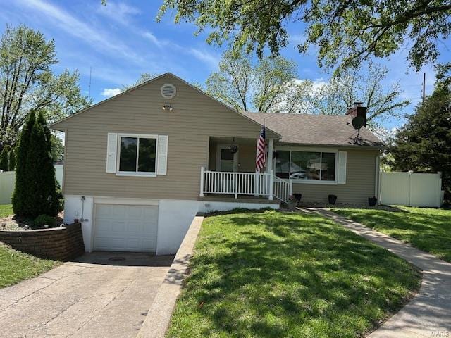 ranch-style home featuring an attached garage, a chimney, a front yard, a porch, and driveway