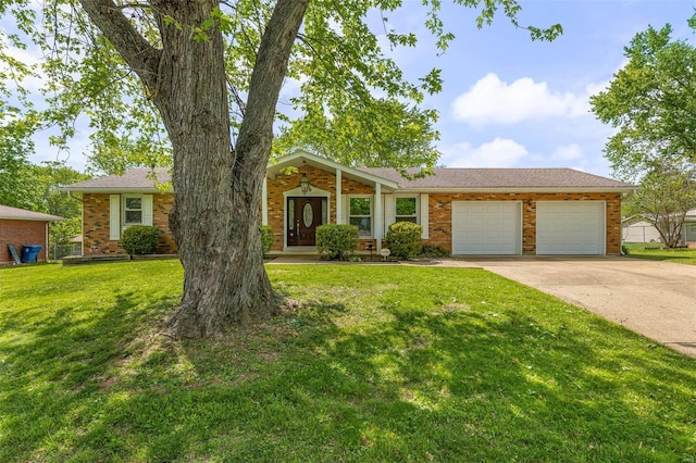ranch-style home featuring a garage, brick siding, driveway, and a front lawn