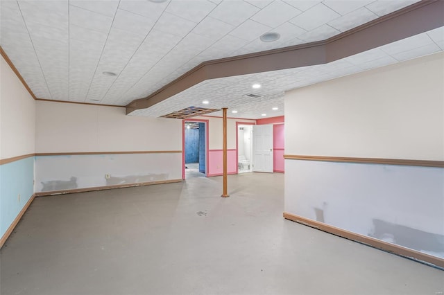 finished basement featuring recessed lighting and baseboards