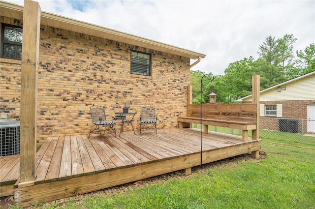 wooden terrace featuring central air condition unit