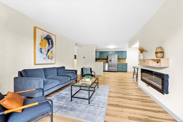 living area featuring light wood finished floors