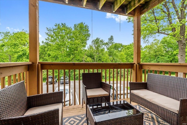 wooden deck featuring outdoor lounge area