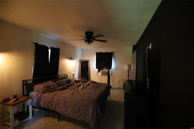 bedroom featuring carpet, a ceiling fan, and cooling unit