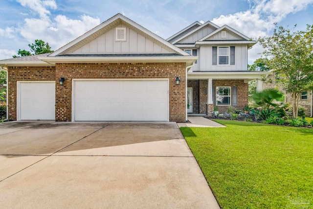 craftsman-style house featuring a garage and a front lawn