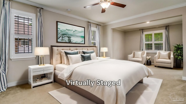 carpeted bedroom with crown molding and ceiling fan