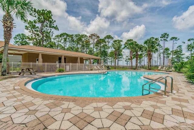 view of pool featuring a patio area