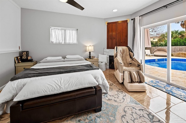 bedroom featuring access to outside and ceiling fan