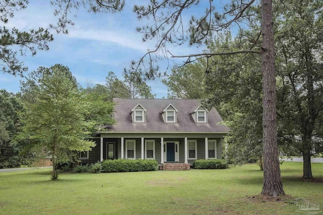 cape cod house with a porch and a front lawn