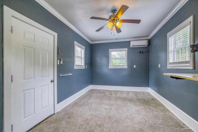 empty room featuring light colored carpet, plenty of natural light, ornamental molding, and an AC wall unit