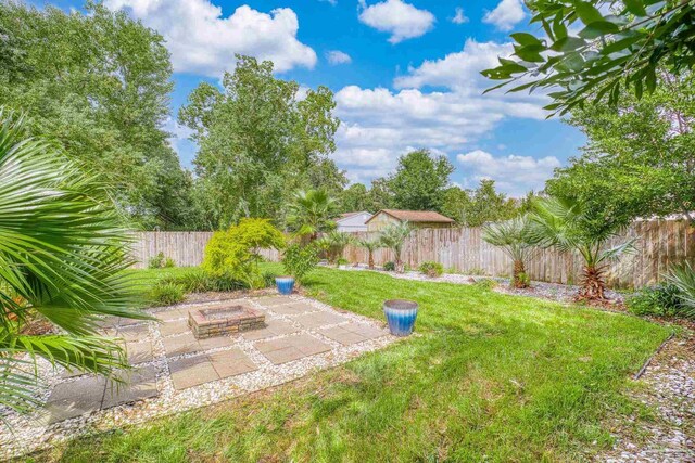 view of yard with a patio area