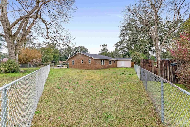 exterior space featuring a fenced backyard