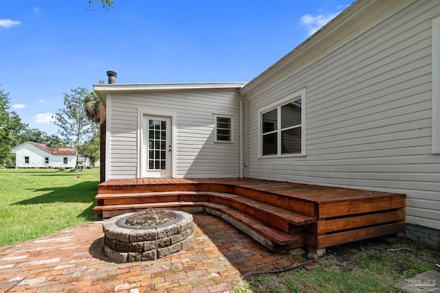 view of patio / terrace with a fire pit