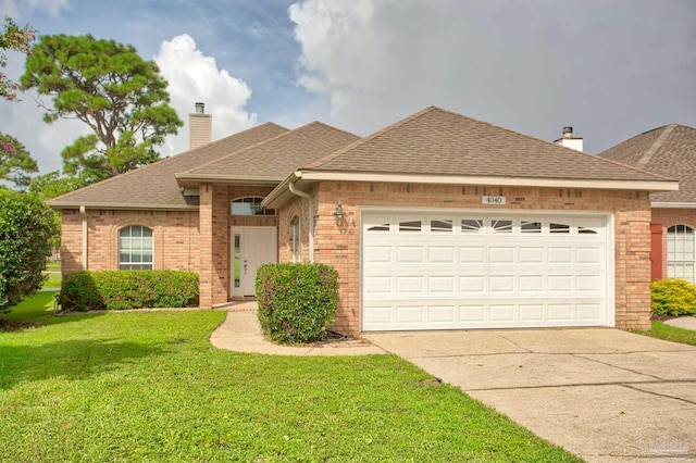 ranch-style house with a garage and a front yard