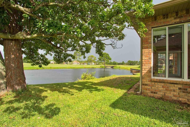 view of yard with a water view