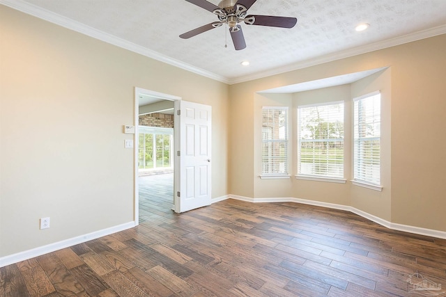 unfurnished room featuring crown molding, ceiling fan, and dark hardwood / wood-style flooring