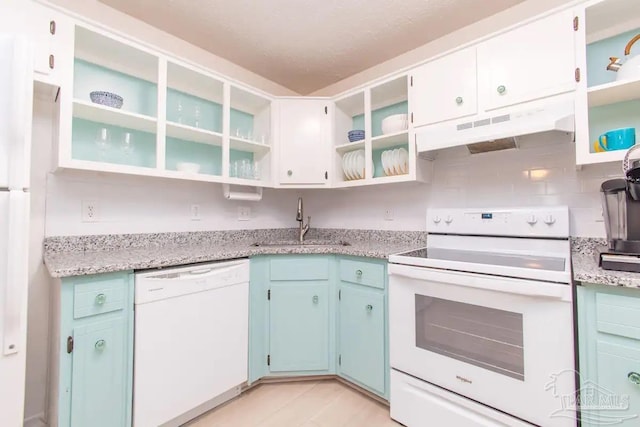 kitchen with white cabinetry, blue cabinets, sink, white dishwasher, and electric range oven