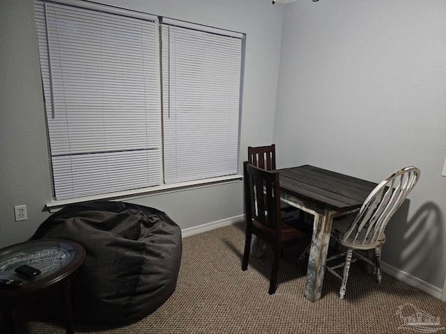 view of carpeted dining space