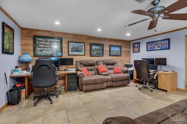 office space featuring crown molding, light tile patterned floors, a textured ceiling, and wood walls