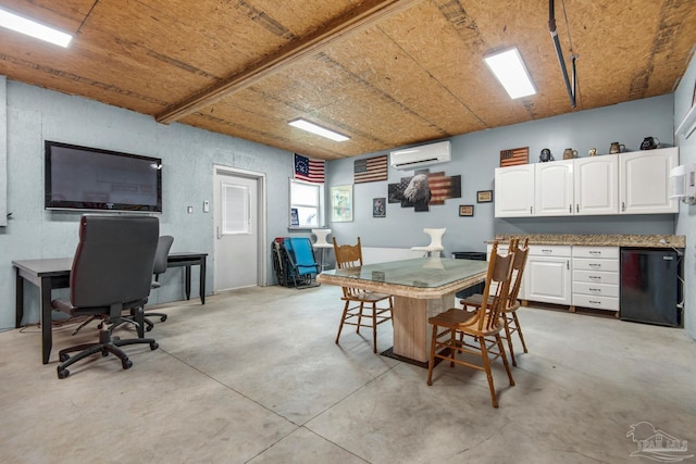 dining room featuring a wall unit AC