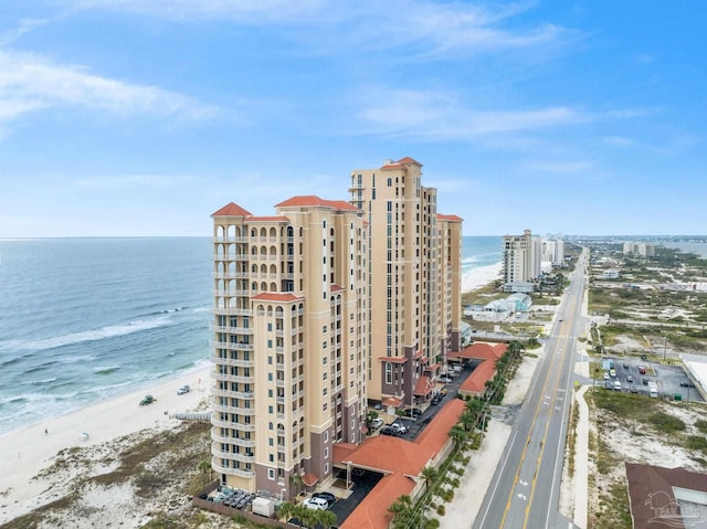 aerial view with a beach view and a water view