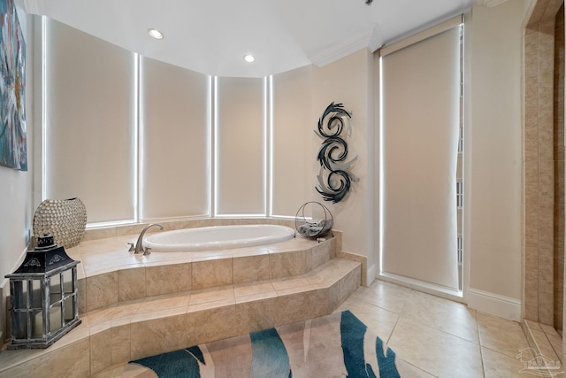 bathroom featuring tile patterned floors and tiled tub