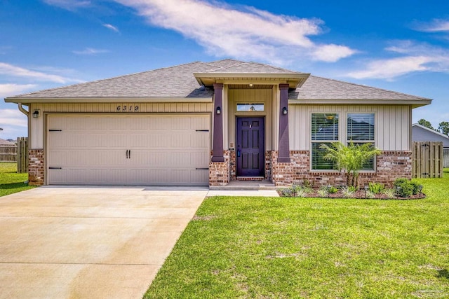 6319 Red Pepper Dr, Gulf Breeze, FL 32563 - view of front of house featuring brick siding, an attached garage, driveway, a shingled roof, and board and batten siding
