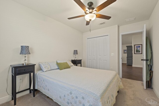 6319 Red Pepper Dr, Gulf Breeze, FL 32563 - carpeted bedroom with a closet, baseboards, and ceiling fan