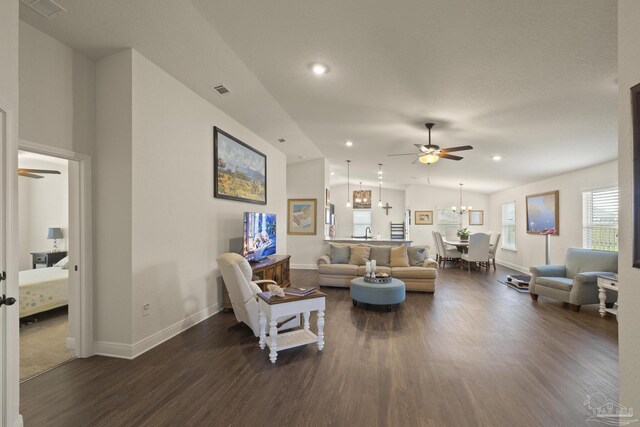 6319 Red Pepper Dr, Gulf Breeze, FL 32563 - living area featuring a ceiling fan, dark wood finished floors, baseboards, recessed lighting, and a chandelier