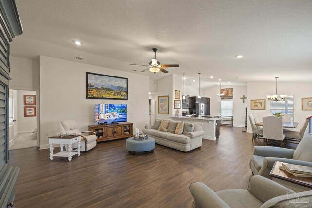 6319 Red Pepper Dr, Gulf Breeze, FL 32563 - living room featuring a chandelier, dark wood-style floors, recessed lighting, ceiling fan, and baseboards