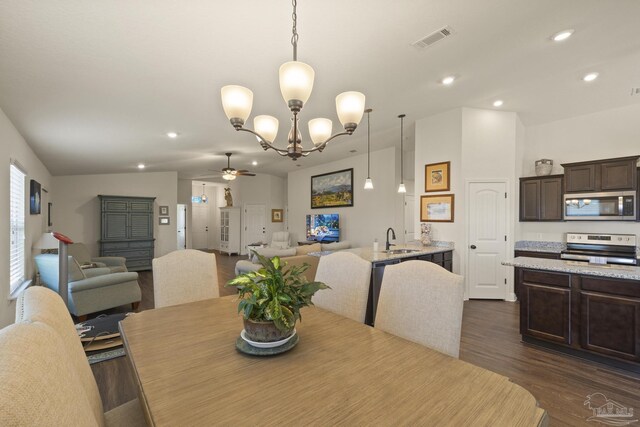 6319 Red Pepper Dr, Gulf Breeze, FL 32563 - dining space featuring ceiling fan, dark wood-style flooring, recessed lighting, a chandelier, and lofted ceiling