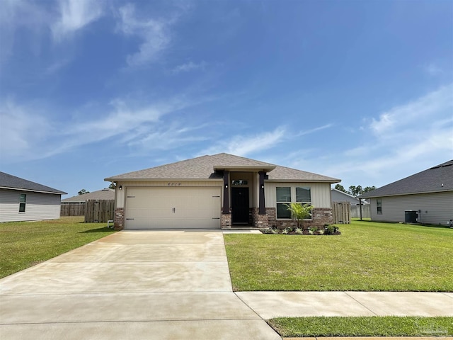 6319 Red Pepper Dr, Gulf Breeze, FL 32563 - prairie-style home featuring brick siding, an attached garage, concrete driveway, and central air condition unit