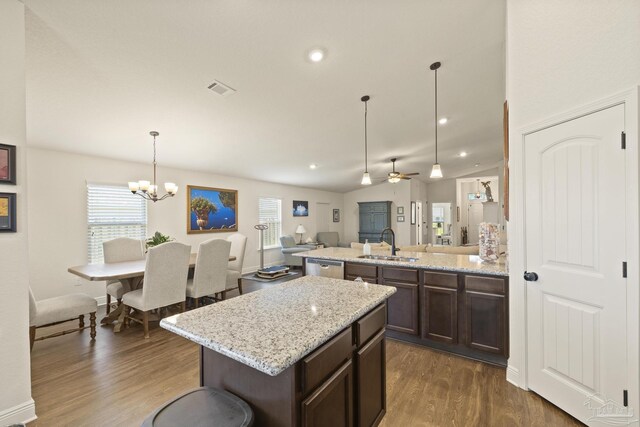6319 Red Pepper Dr, Gulf Breeze, FL 32563 - kitchen with a sink, dark wood finished floors, stainless steel dishwasher, dark brown cabinetry, and recessed lighting