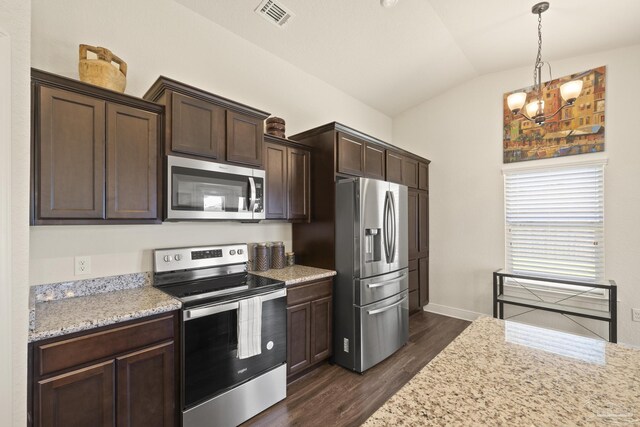 6319 Red Pepper Dr, Gulf Breeze, FL 32563 - kitchen with appliances with stainless steel finishes, dark wood finished floors, lofted ceiling, dark brown cabinets, and a chandelier