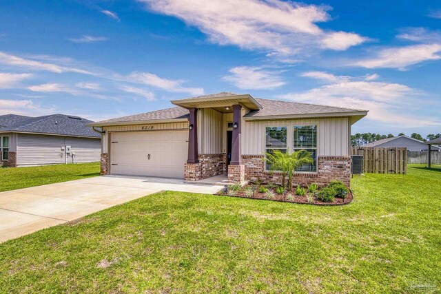 6319 Red Pepper Dr, Gulf Breeze, FL 32563 - view of front of home with brick siding, an attached garage, concrete driveway, board and batten siding, and central AC