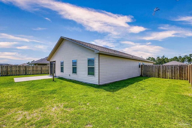 6319 Red Pepper Dr, Gulf Breeze, FL 32563 - view of property exterior with a patio area