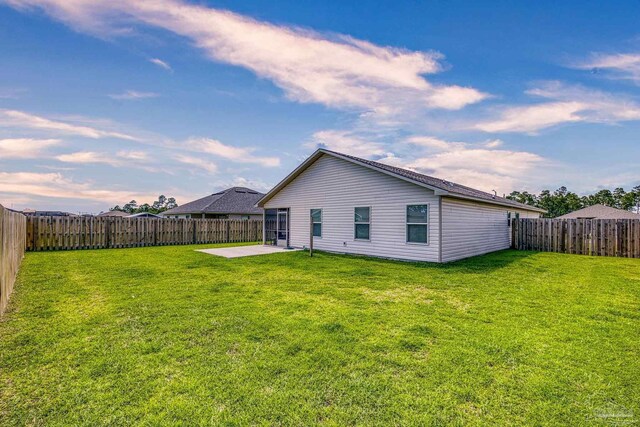 6319 Red Pepper Dr, Gulf Breeze, FL 32563 - rear view of house featuring a patio