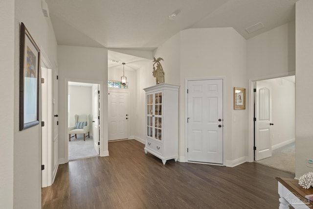 6319 Red Pepper Dr, Gulf Breeze, FL 32563 - foyer with dark wood-style flooring and baseboards