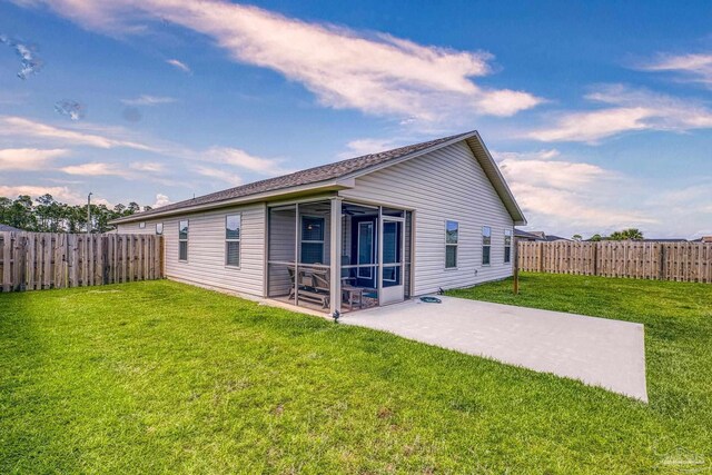 6319 Red Pepper Dr, Gulf Breeze, FL 32563 - back of house with a sunroom and a patio area