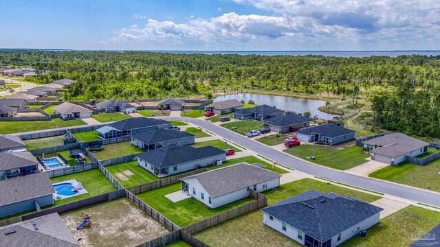 6319 Red Pepper Dr, Gulf Breeze, FL 32563 - aerial view of residential area with a large body of water and a heavily wooded area