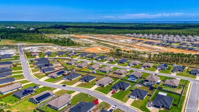 6319 Red Pepper Dr, Gulf Breeze, FL 32563 - aerial overview of property's location featuring a forest and nearby suburban area