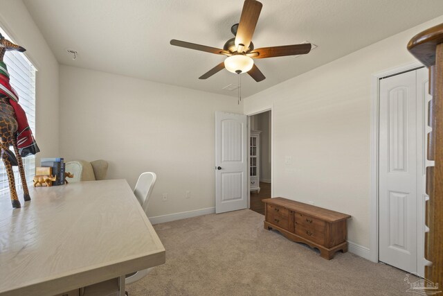 6319 Red Pepper Dr, Gulf Breeze, FL 32563 - home office with a ceiling fan, carpet flooring, and baseboards