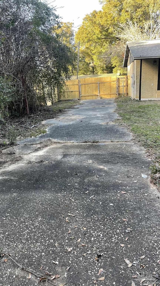 view of street with aphalt driveway