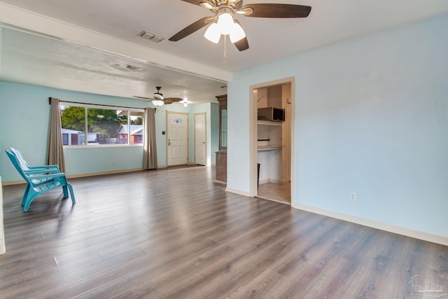 interior space with ceiling fan and hardwood / wood-style floors