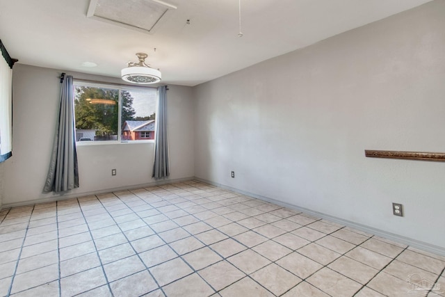 view of tiled spare room