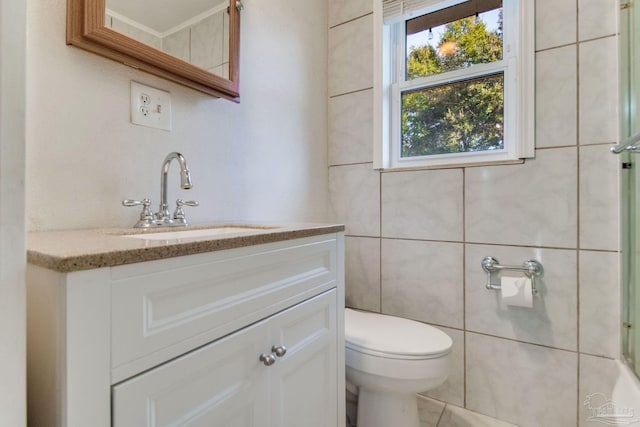 bathroom featuring toilet and vanity